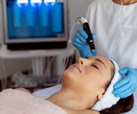 a woman getting a Hydrafacial