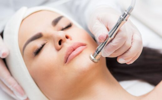 a woman getting a Microdermabrasion treatment for her face